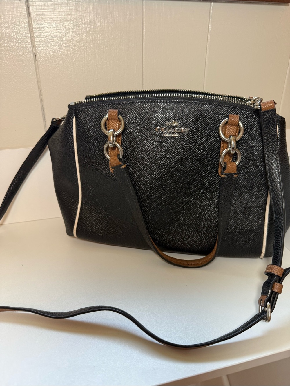 Coach Christie Carryall black leather with brown accents. Purse, bag.